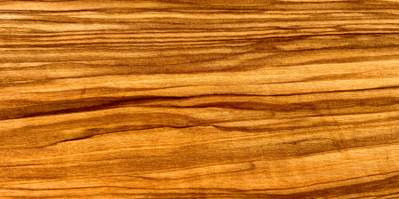 Olive wood products Beautifully grained olive wood items that bring a warm tone to the table.