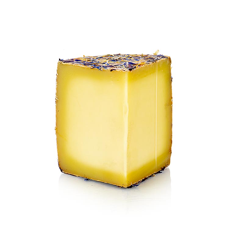Pequena flor alpina, queso de leche de vaca madurado 4 meses, tarta de queso - aproximadamente 250 gramos - vacio